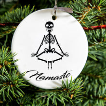 DistinctInk® Hanging Ceramic Christmas Tree Ornament with Gold String - Great Gift / Present - 2 3/4 inch Diameter - Namaste Yoga Skeleton
