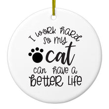 DistinctInk® Hanging Ceramic Christmas Tree Ornament with Gold String - Great Gift / Present - 2 3/4 inch Diameter - I Work Hard So My Cat Can Have a Better Life