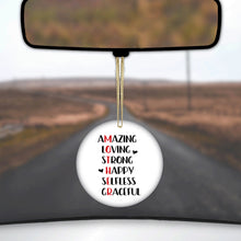 DistinctInk® Hanging Ceramic Christmas Tree Ornament with Gold String - Great Gift / Present - 2 3/4 inch Diameter - Mother Word Art - Amazing, Loving, Strong