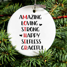 DistinctInk® Hanging Ceramic Christmas Tree Ornament with Gold String - Great Gift / Present - 2 3/4 inch Diameter - Mother Word Art - Amazing, Loving, Strong