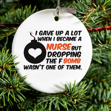 DistinctInk® Hanging Ceramic Christmas Tree Ornament with Gold String - Great Gift / Present - 2 3/4 inch Diameter - Gave Up A Lot When I Became a Nurse - F Bomb