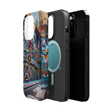 DistinctInk Tough Case for Apple iPhone, Compatible with MagSafe Charging - "Colorful Urban Masterpiece: Bursting Life on Concrete Canvas"