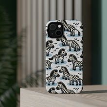 DistinctInk Tough Case for Apple iPhone, Compatible with MagSafe Charging - "Zany Zebras: Unique and Engaging Cartoon Pattern"