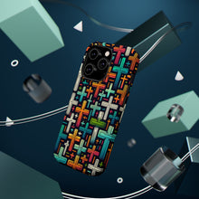 DistinctInk Tough Case for Apple iPhone, Compatible with MagSafe Charging - "Vibrant Cartoon Crosses on Dark Background"