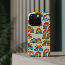 DistinctInk Tough Case for Apple iPhone, Compatible with MagSafe Charging - "Cheerful Cartoon Rainbows on Light Background"