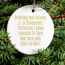 DistinctInk® Hanging Ceramic Christmas Tree Ornament with Gold String - Great Gift / Present - 2 3/4 inch Diameter - Drinking Driving Dangerous Guy Stole Beer