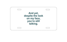 DistinctInk Custom Aluminum Decorative Vanity Front License Plate - Despite the Look On My Face, Still Talking