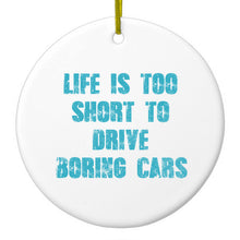 DistinctInk® Hanging Ceramic Christmas Tree Ornament with Gold String - Great Gift / Present - 2 3/4 inch Diameter - Life is Too Short to Drive Boring Cars