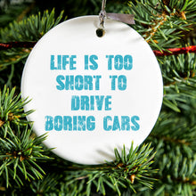 DistinctInk® Hanging Ceramic Christmas Tree Ornament with Gold String - Great Gift / Present - 2 3/4 inch Diameter - Life is Too Short to Drive Boring Cars