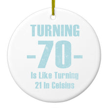 DistinctInk® Hanging Ceramic Christmas Tree Ornament with Gold String - Great Gift / Present - 2 3/4 inch Diameter - Turning 70 is Like Turning 21 in Celsius