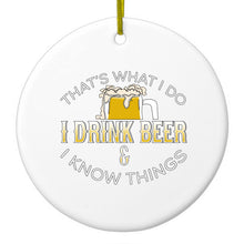 DistinctInk® Hanging Ceramic Christmas Tree Ornament with Gold String - Great Gift / Present - 2 3/4 inch Diameter - I Drink Beer & I Know Things