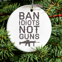 DistinctInk® Hanging Ceramic Christmas Tree Ornament with Gold String - Great Gift / Present - 2 3/4 inch Diameter - Ban Idiots, Not Guns