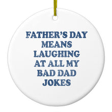 DistinctInk® Hanging Ceramic Christmas Tree Ornament with Gold String - Great Gift / Present - 2 3/4 inch Diameter - Father's Day Means Laughing At Bad Dad Jokes