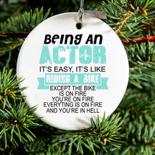 DistinctInk® Hanging Ceramic Christmas Tree Ornament with Gold String - Great Gift / Present - 2 3/4 inch Diameter - Being An Actor is Easy - It's Like Riding A Bike