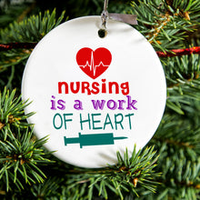 DistinctInk® Hanging Ceramic Christmas Tree Ornament with Gold String - Great Gift / Present - 2 3/4 inch Diameter - Nursing is a Work of Heart
