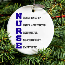 DistinctInk® Hanging Ceramic Christmas Tree Ornament with Gold String - Great Gift / Present - 2 3/4 inch Diameter - Nurse Never Gives Up