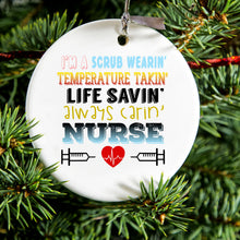 DistinctInk® Hanging Ceramic Christmas Tree Ornament with Gold String - Great Gift / Present - 2 3/4 inch Diameter - Scrub Wearing Temp Taking Life Saving Nurse