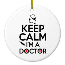 DistinctInk® Hanging Ceramic Christmas Tree Ornament with Gold String - Great Gift / Present - 2 3/4 inch Diameter - Keep Calm I'm A Doctor