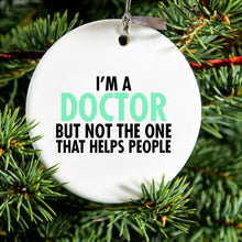DistinctInk® Hanging Ceramic Christmas Tree Ornament with Gold String - Great Gift / Present - 2 3/4 inch Diameter - I'm a Doctor But Not The One That Helps People