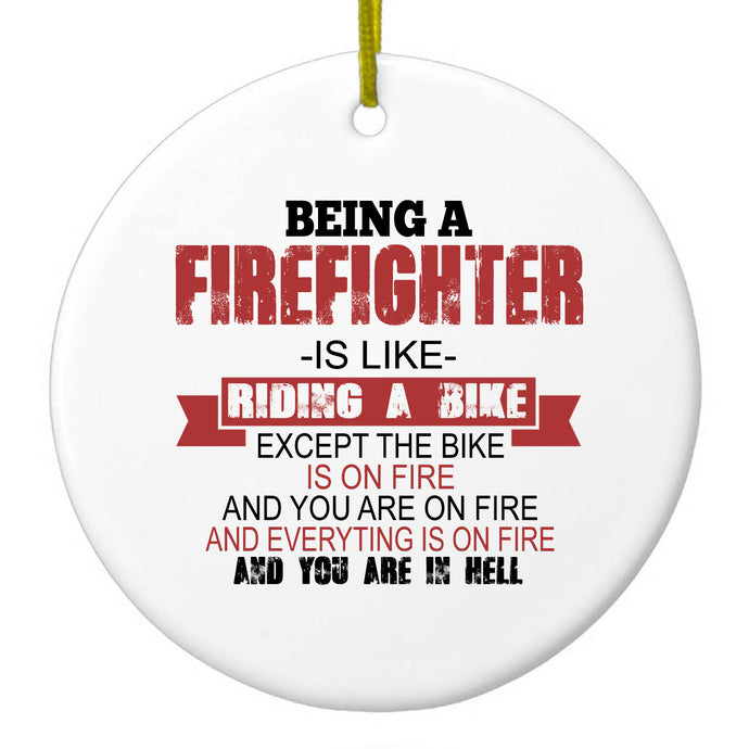 DistinctInk® Hanging Ceramic Christmas Tree Ornament with Gold String - Great Gift / Present - 2 3/4 inch Diameter - Being a Firefighter is Like Riding A Bike On Fire