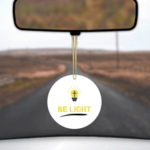 DistinctInk® Hanging Ceramic Christmas Tree Ornament with Gold String - Great Gift / Present - 2 3/4 inch Diameter - BE LIGHT - Cross in a Light Bulb