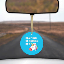 DistinctInk® Hanging Ceramic Christmas Tree Ornament with Gold String - Great Gift / Present - 2 3/4 inch Diameter - In a Field of Horses, Be a Unicorn - Blue