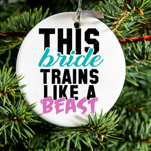 DistinctInk® Hanging Ceramic Christmas Tree Ornament with Gold String - Great Gift / Present - 2 3/4 inch Diameter - This Bride Trains Like a Beast