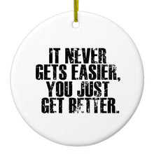 DistinctInk® Hanging Ceramic Christmas Tree Ornament with Gold String - Great Gift / Present - 2 3/4 inch Diameter - It Never Gets Easier You Just Get better